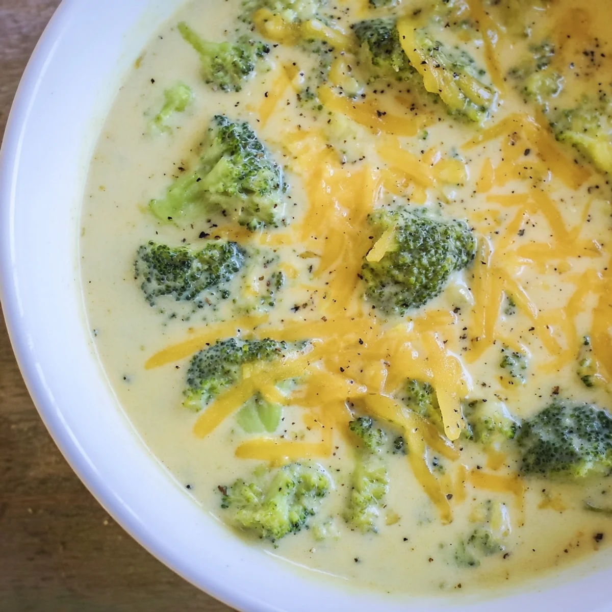 A rich, creamy Broccoli Cheese Soup, a vibrant green hue, made with fresh broccoli florets.