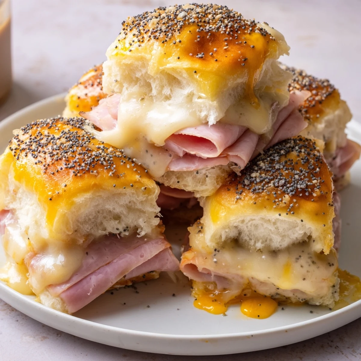 Melted Swiss cheese oozes over savory baked ham in these delicious Party Sliders, ready to eat.