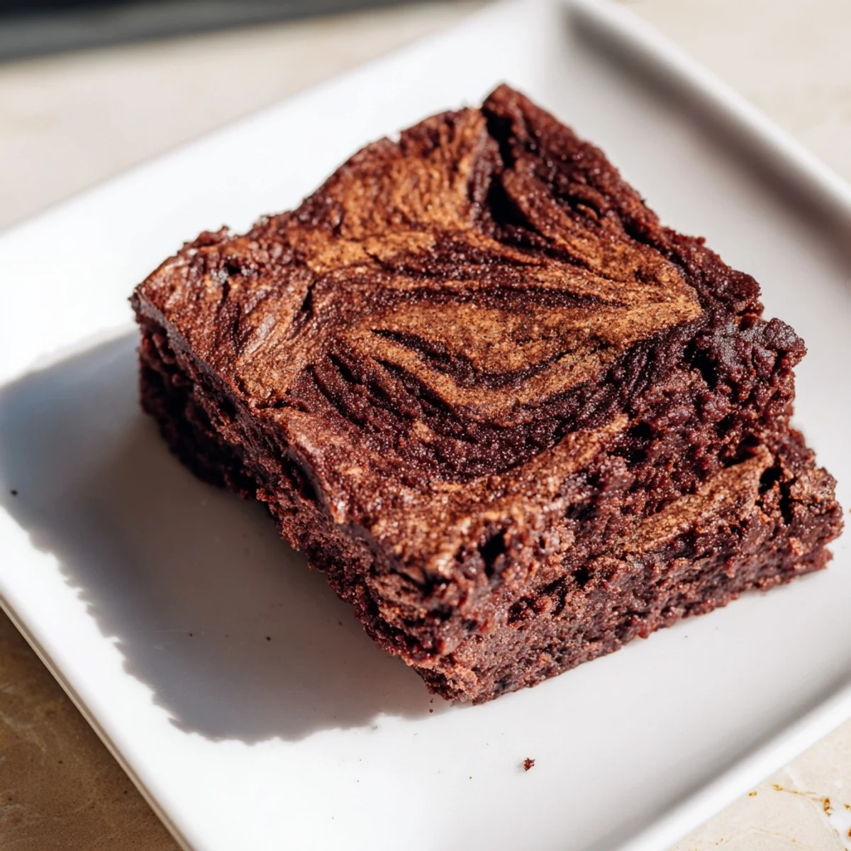 Warm, gooey Pumpkin Workout Brownies, perfect post-gym treat with rich, chocolatey goodness.
