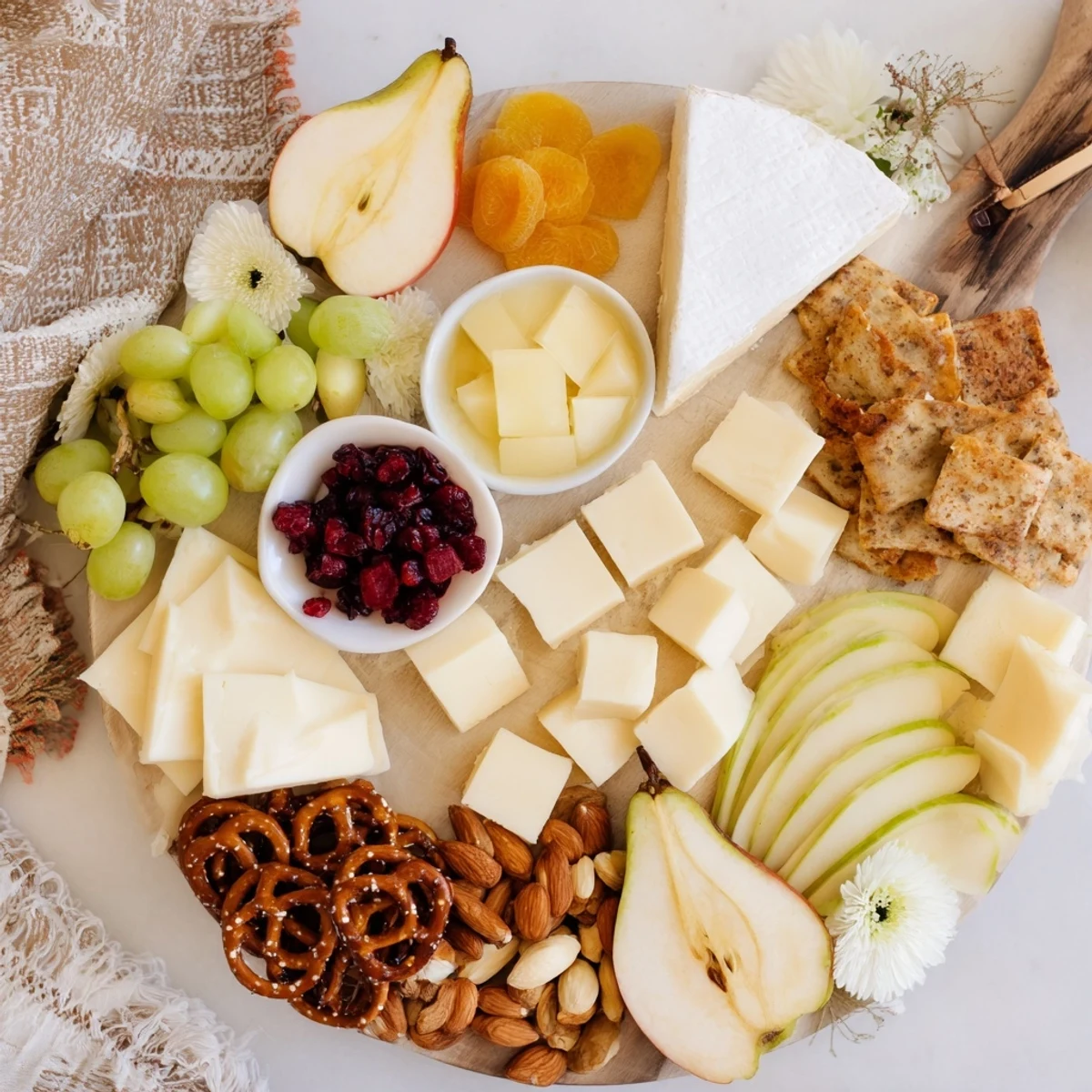 Bridal Shower Bubbly Board overflowing with elegant cheeses, fruit, and bubbly, perfect for the occasion.