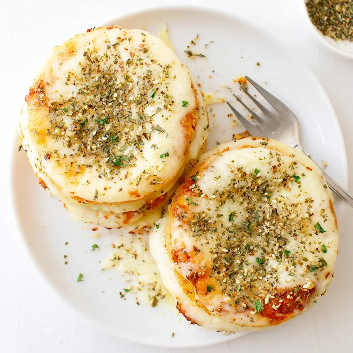 Baked vegetarian rice cake cheese stacks served warm, ready to be dipped in marinara sauce.