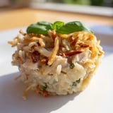 Baked to perfection, these Marry Me Chicken Sushi Bake Cups feature a flavorful orzo and chicken filling.