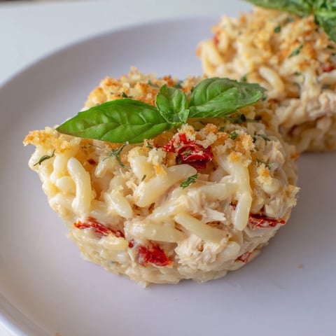 Golden-brown Marry Me Chicken Sushi Bake Cups, loaded with creamy chicken and orzo, perfect appetizer.