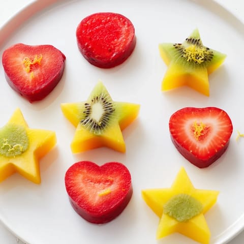 Vibrant Midnight Kiss Star and Heart cocktail garnishes, ready to enhance any celebratory drink.