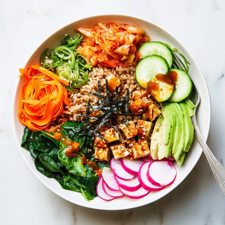 Delicious fermented vegetable bowl featuring tangy kimchi, crisp veggies, and savory dressing.